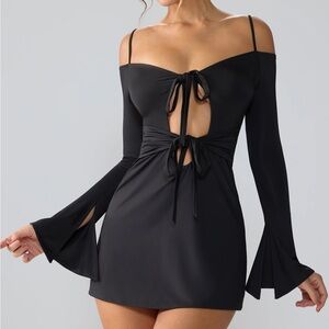 Black cut out tie bell sleeve mini dress